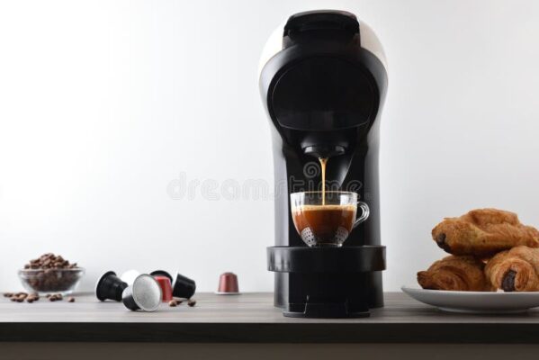 background machine preparing coffee espresso white isolated kitchen bench capsules beans pastries front view 407415569